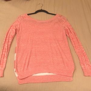 Cute pink sweater with knit detailing on sleeves and stripped back